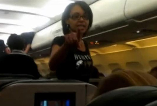 Woman arrested on plane