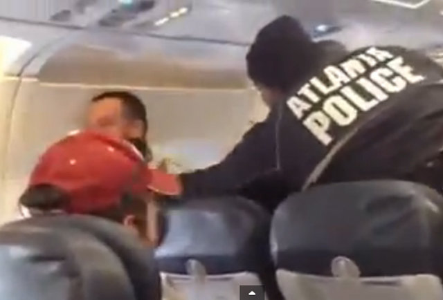Dude being detained on flight